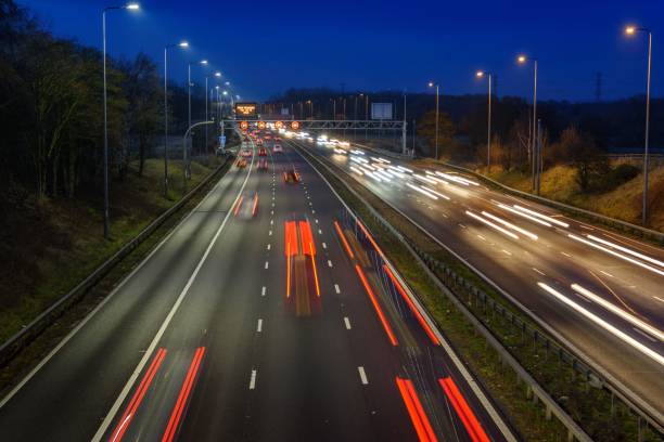 istock Fast moving traffic on the M42 passes through an active traffic management system during rush hour. 1461569570