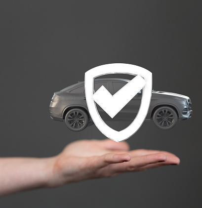 A 3D rendered car and shield check mark icon over a person's hand isolated on gray background