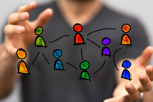 istock 3D rendered colorful people icons in man's hands 1461570671