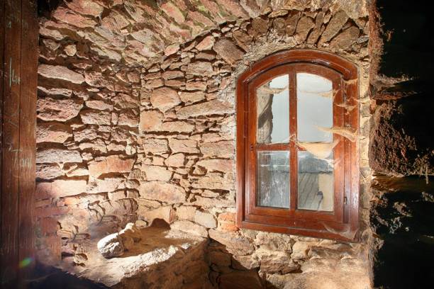 istock Dusty wooden window in an old brick building 1461572795