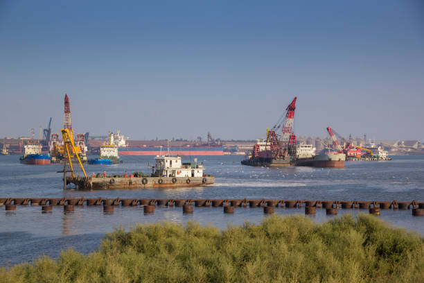 istock Floating machinery for carrying out dredging works in the sea harbor 1461573046