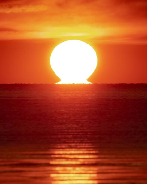 istock Vertical shot of a seascape at sunset 1461576932