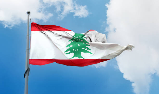istock Lebanon flag - realistic waving fabric flag 1461577704