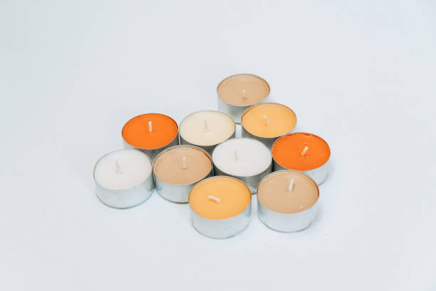 istock Closeup of decorative candles on a white background 1461579905
