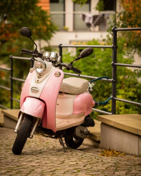 istock Pink motorcycle parked in street 1461583058