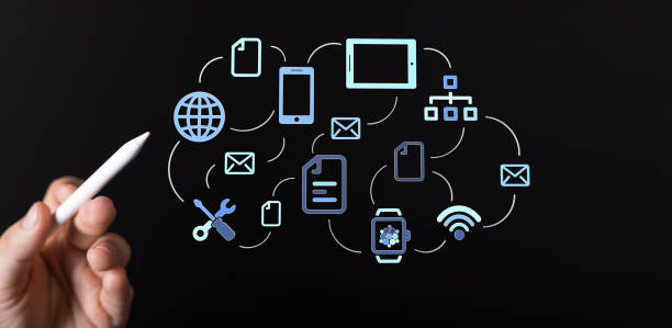 istock 3D rendered abstract of digital network system icons and a pencil in hand on black background 1461583436