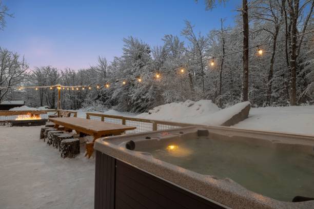 istock Table with chhairs and a small pool in outside during the winter. 1461583678