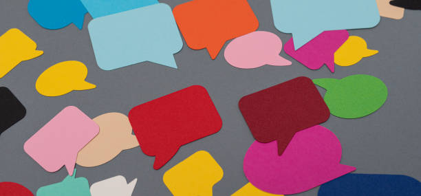 istock Closeup shot of a speech bubbles on the gray background 1461585291