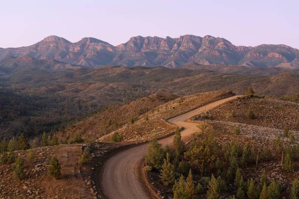 istock Landscape of mountains and trees under the sunset sky. 1461585557