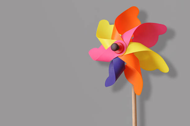 istock Colorful pinwheel isolated on the gray background with copy space 1461586274