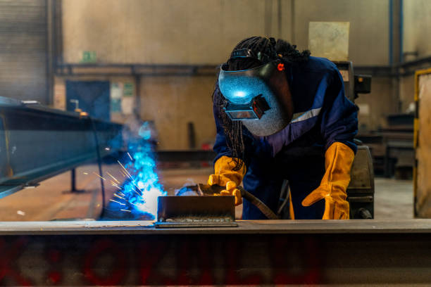 istock Young  Woman Welding 1461586657