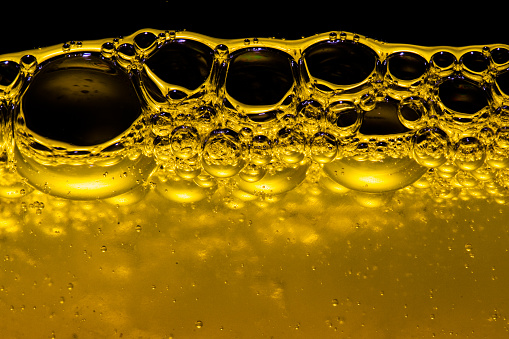 A yellow liquid with bubbles