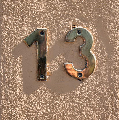 A Closeup of the number 8 on the wall