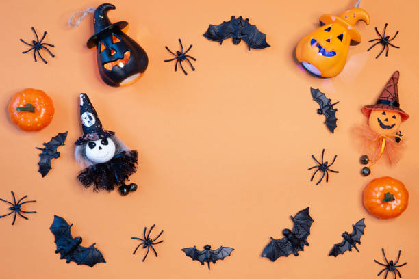istock Halloween composition decorated with pumpkins and typical ornaments - copy space 1461592146