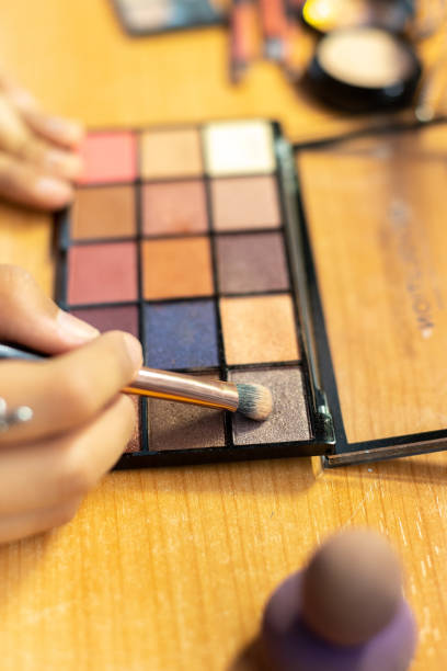 istock Closeup of a smearing brush on a makeup palette 1461592731