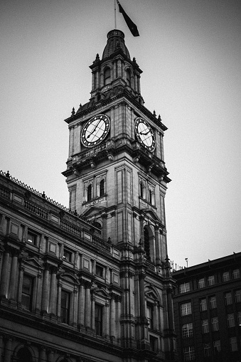 A low angle shot of Melbourne's GPO in Melbourne, Australia in grayscale