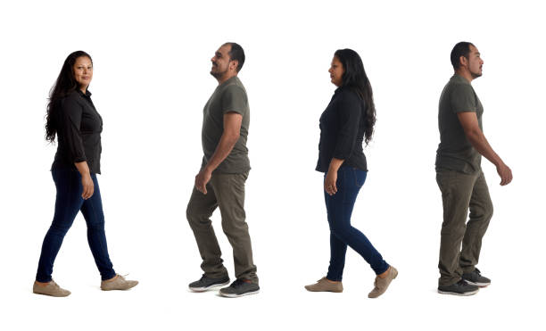 istock woman and man walking on white background 1461596444