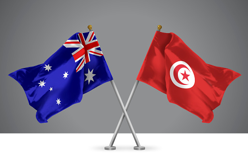 3D illustration of Two Wavy Crossed Flags of Australia and Tunisia, Sign of Australian and Tunisian Relationships