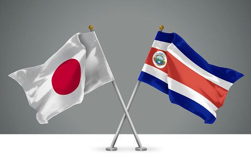 3D illustration of Two Wavy Crossed Flags of Japan and Costa Rica, Sign of Japanese and Costa Rican Relationships