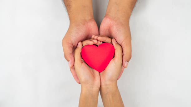 istock Lovers give heart to their partner concept for romantic background 1461599472