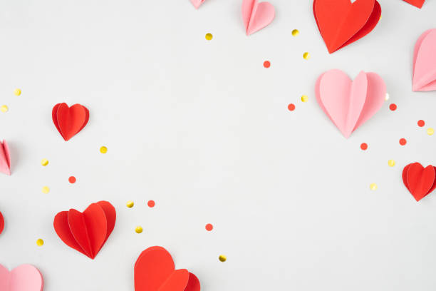 istock Origami hearts flat lay composition into frames for backgrounds and copy spaces 1461599507