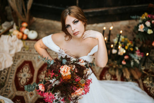 istock Beautiful bride in rustic arrangement by sunset 1461612483