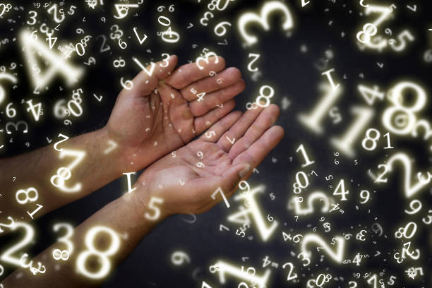 istock numerology, outstretched hands with open palm surrounded by numbers 1461613392