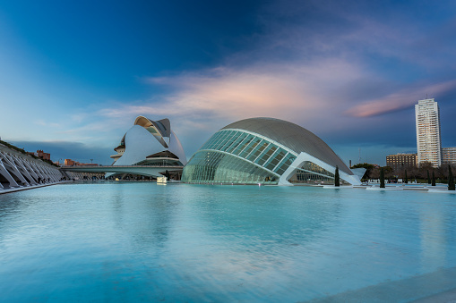 Valencia, Spain - January 20, 2023: Beautiful sunset over the Hemisferic Planetarium in the City of Arts and Sciences, Valencia. Spain