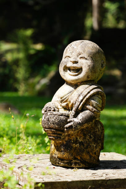 istock Monk doll happily smiling statue in Thai Temple 1461617600