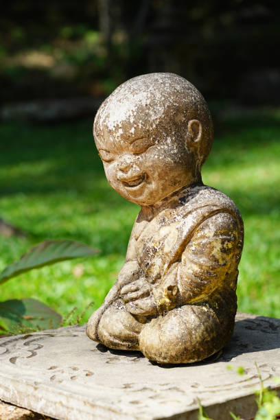 istock Monk doll smiling statue in the temple, Thailand 1461618109