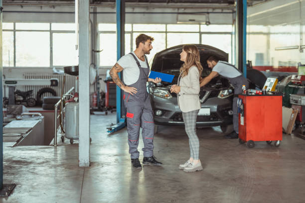 istock Car Mechanic and Customer 1461620223