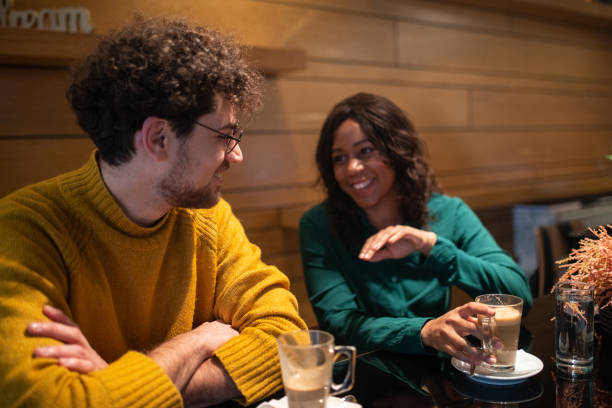 istock Friends sitting in cafe 1461622844