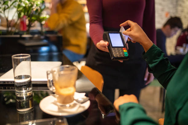 istock Credit card payment in cafe 1461624278