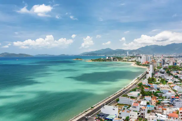 Beautiful view on Nha Trang and Nha Trang Bay of the South China Sea with magic colors of water in Khanh Hoa province, Vietnam. Nha Trang is a popular tourist destination of Asia.