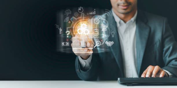 istock Creativity and Targeting, Businessman holding Light bulb, Business global internet connection application technology and digital marketing, finance, and banking, Digital link tech, big data. 1461632038