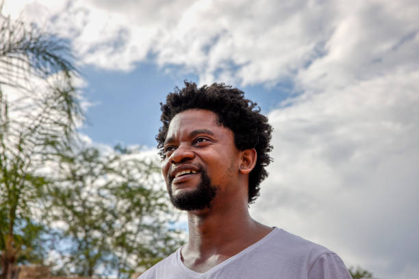 istock handsome african man with natural hairstyle 1461633685