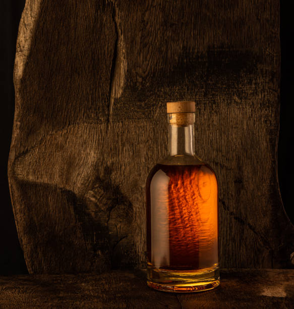 istock Golden alcoholic drink in decanter, bottle and glass 1461642423