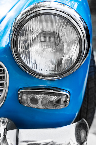 Headlight of a retro car, close-up photo