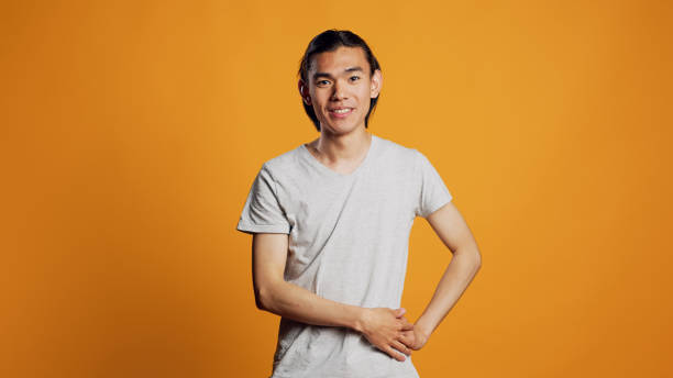 istock Happy carefree man enjoying jokes in studio 1461646504