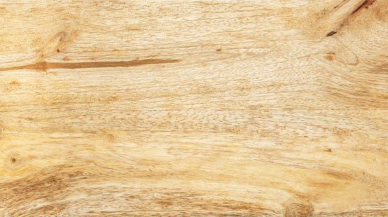 The texture of the poplar wood plank. Photo close-up.