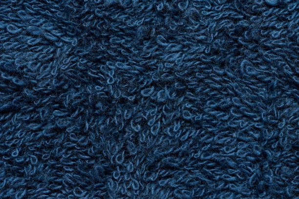 istock Texture of a blue terry cotton towel, canvas. 1461655620