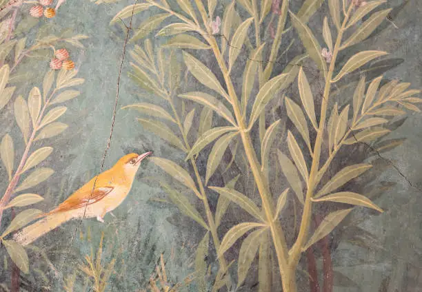 Photo of Italy, Pompeii - Luxury roman house interior, fresco detail with bird in a garden