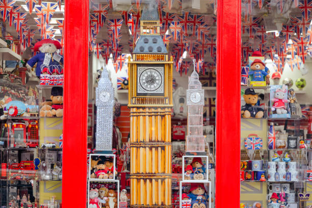 Retail display of traditional British souvenirs in London store window Retail display of all kinds of traditional British gifts and souvenirs in a London tourist shop. london memorabilia stock pictures, royalty-free photos & images