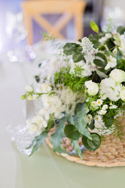 istock Flower composition with green white flowers 1461658799