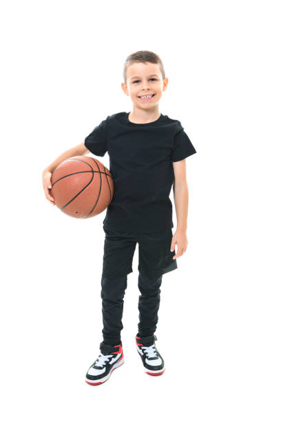 istock boy playing basketball isolated on white background 1461664805