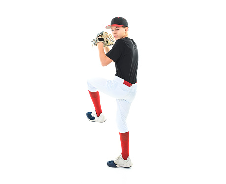 Sports person, pitching and baseball outdoor on pitch for performance and competition. Behind professional athlete or softball player for team game, training or exercise challenge at field or stadium