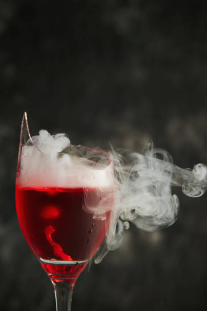 istock Alcohol and smoke in broken glass 1461664922