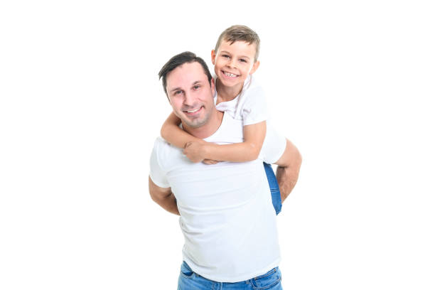 istock father with adorable little son isolated on white 1461665466