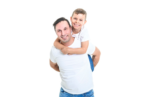 A father with adorable little son isolated on white