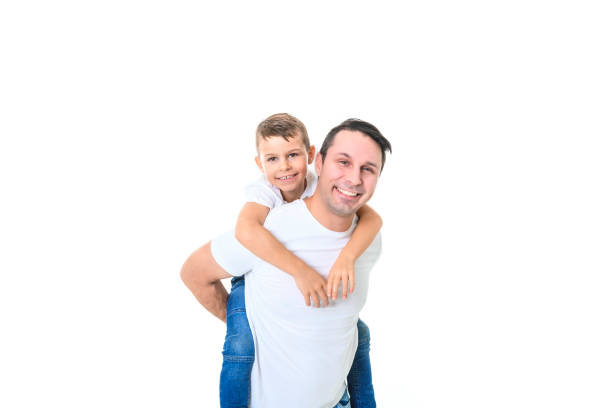 A father with adorable little son isolated on white